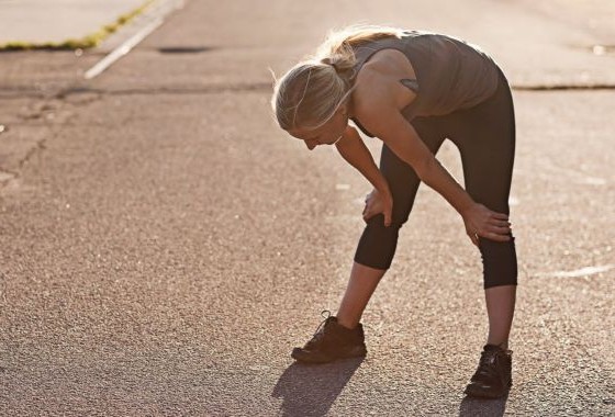Runner cooling down with a gentle jog after a session